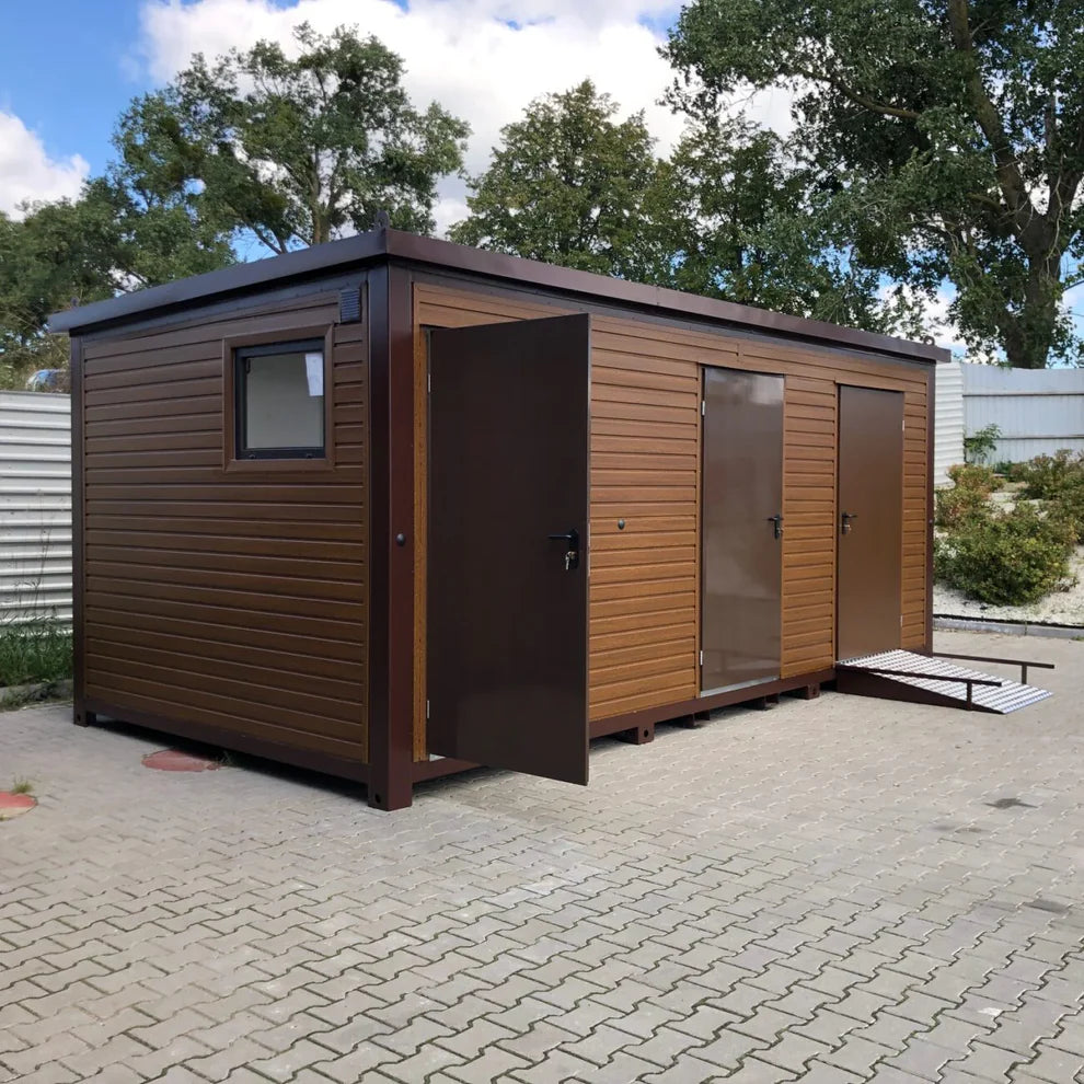 Conteneur sanitaire avec un revêtement extérieur imitation bois