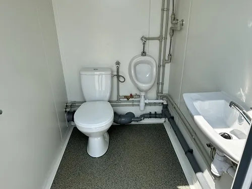 Conteneur sanitaire fixe à trois cabines
