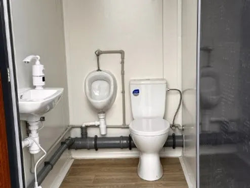 Conteneur sanitaire de type pavillon à trois cabines