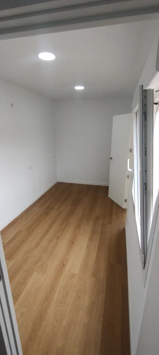 Maison conteneur en L 2 conteneurs de 20 pieds